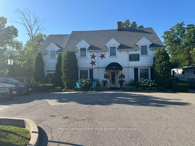 Photo 1 of 10 King Street E, Kawartha Lakes, Bobcaygeon — HOMEH