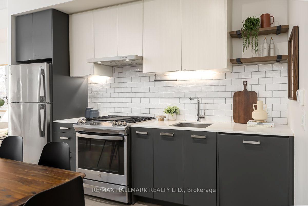 Photo 3 of Unit 403, 1331 Queen Street E, Toronto, South Riverdale — HOMEH