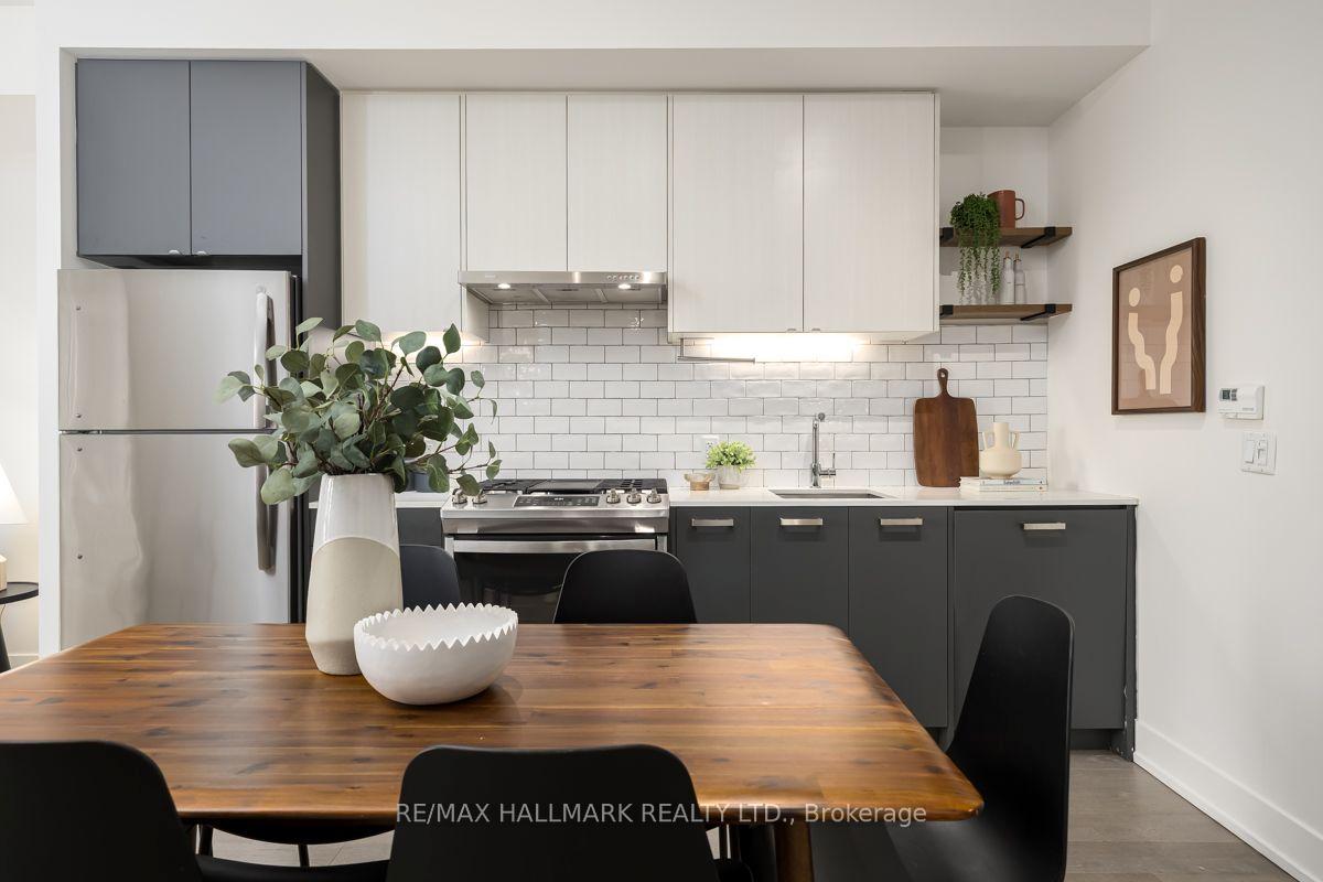 Photo 4 of Unit 403, 1331 Queen Street E, Toronto, South Riverdale — HOMEH