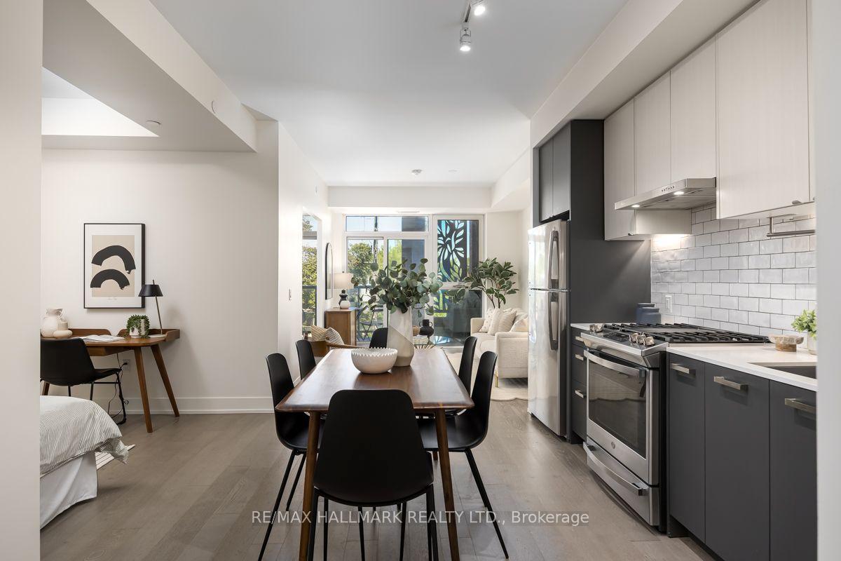 Photo 5 of Unit 403, 1331 Queen Street E, Toronto, South Riverdale — HOMEH