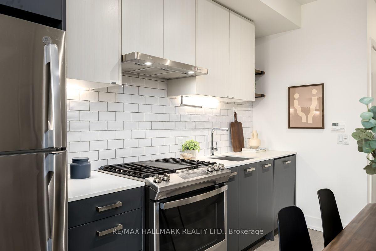 Photo 6 of Unit 403, 1331 Queen Street E, Toronto, South Riverdale — HOMEH