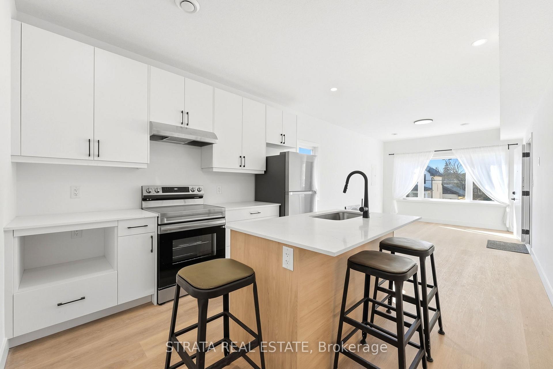 Photo 3 of 108 Briscoe Street E, London, South F — HOMEH