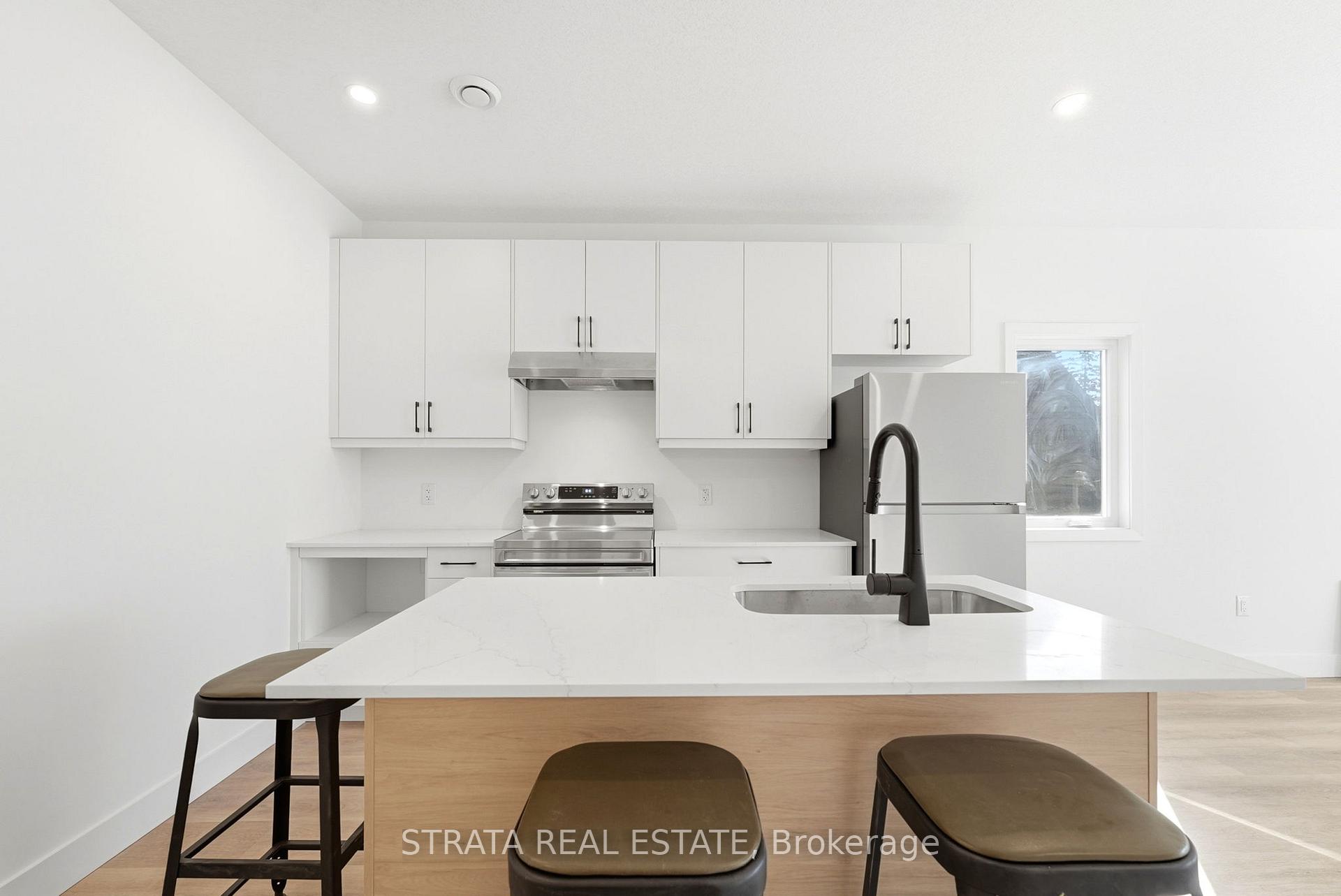 Photo 5 of 108 Briscoe Street E, London, South F — HOMEH