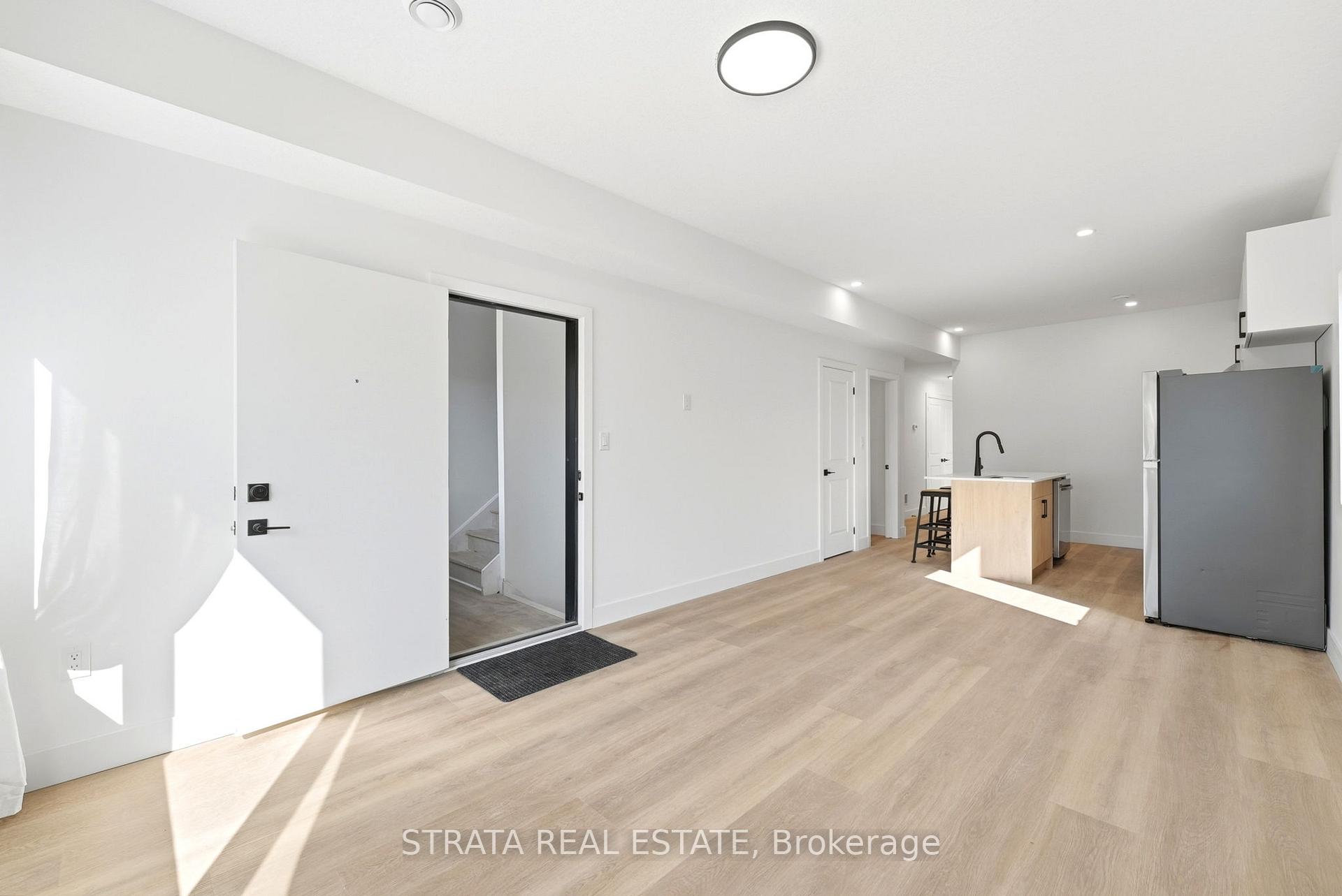 Photo 8 of 108 Briscoe Street E, London, South F — HOMEH