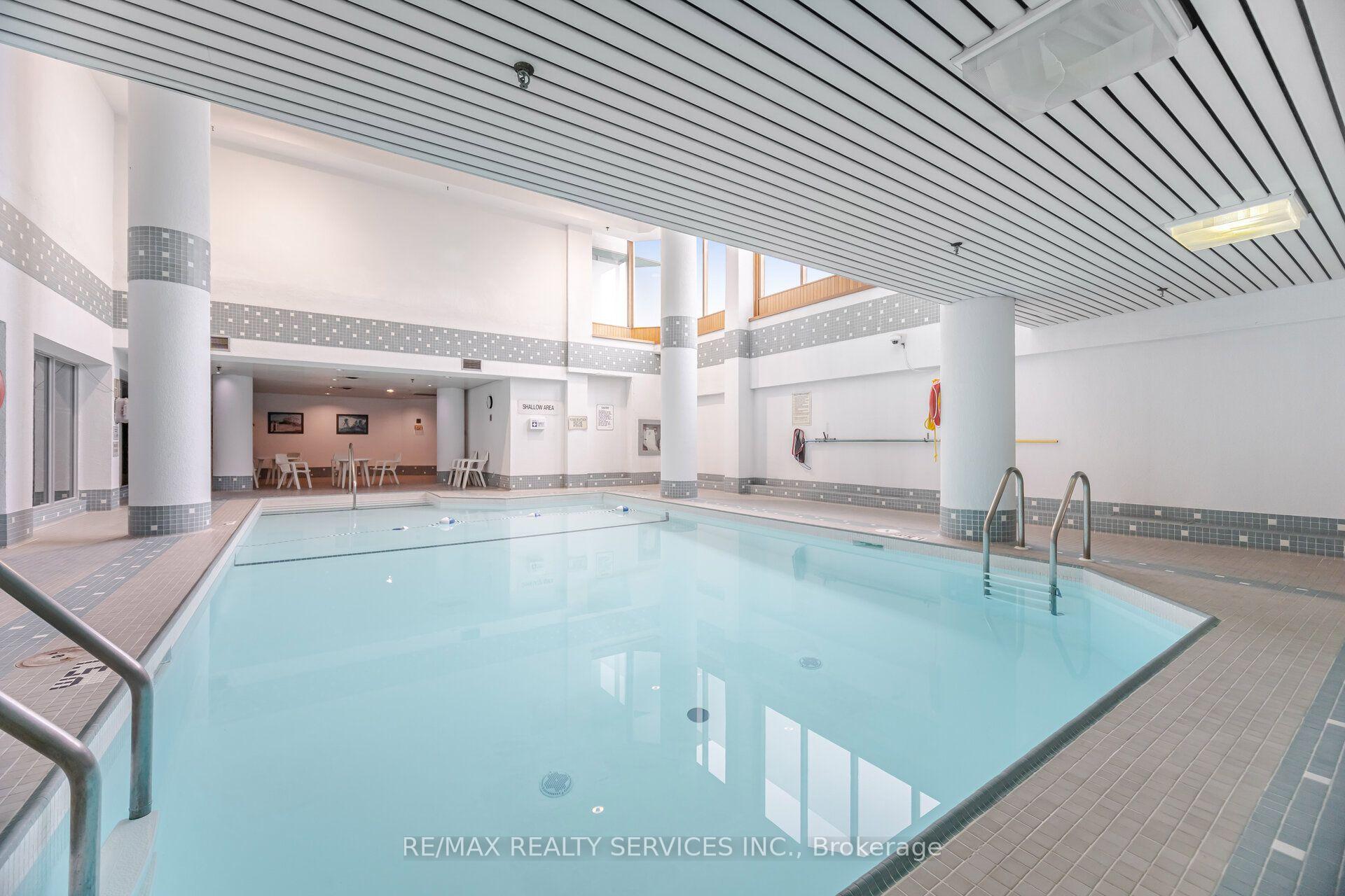 Photo 36 of Unit 404, 330 Mill Street S, Brampton, Brampton South — HOMEH