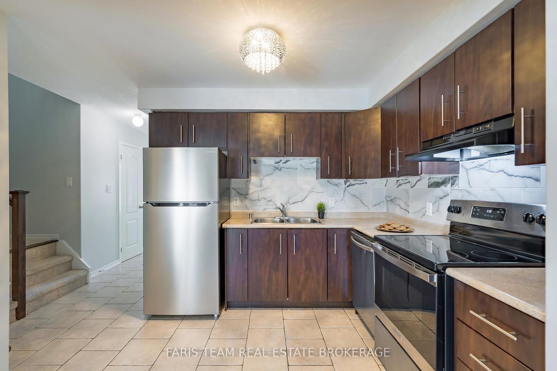 Photo 6 of Unit 48, 75 Prince William Way, Barrie, Innis-Shore — HOMEH