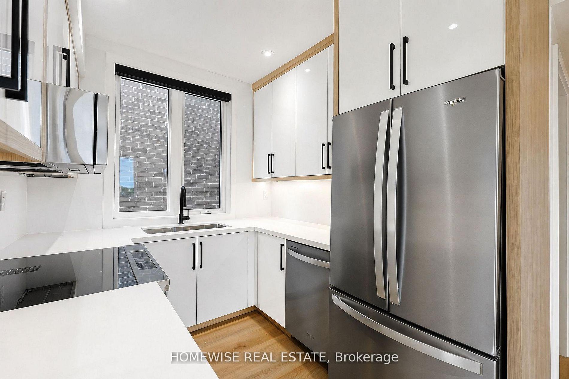 Photo 3 of Unit 4, 159 Locksley Avenue, North York, Briar Hill-Belgravia — HOMEH