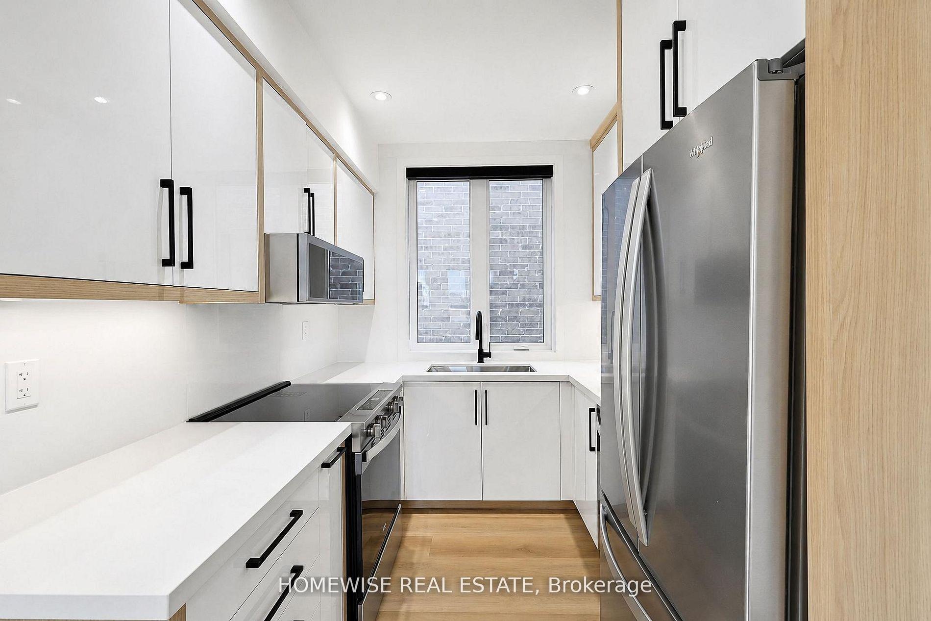 Photo 4 of Unit 4, 159 Locksley Avenue, North York, Briar Hill-Belgravia — HOMEH