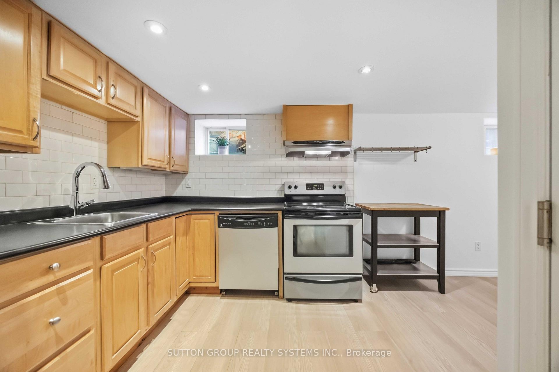 Photo 5 of Unit Lower, 103 Ashdale Avenue, Toronto, Greenwood-Coxwell — HOMEH