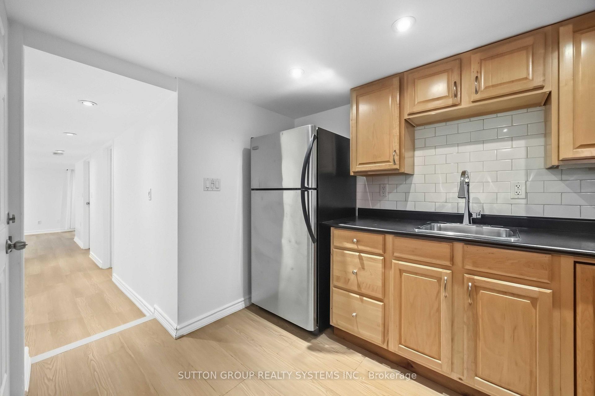 Photo 10 of Unit Lower, 103 Ashdale Avenue, Toronto, Greenwood-Coxwell — HOMEH