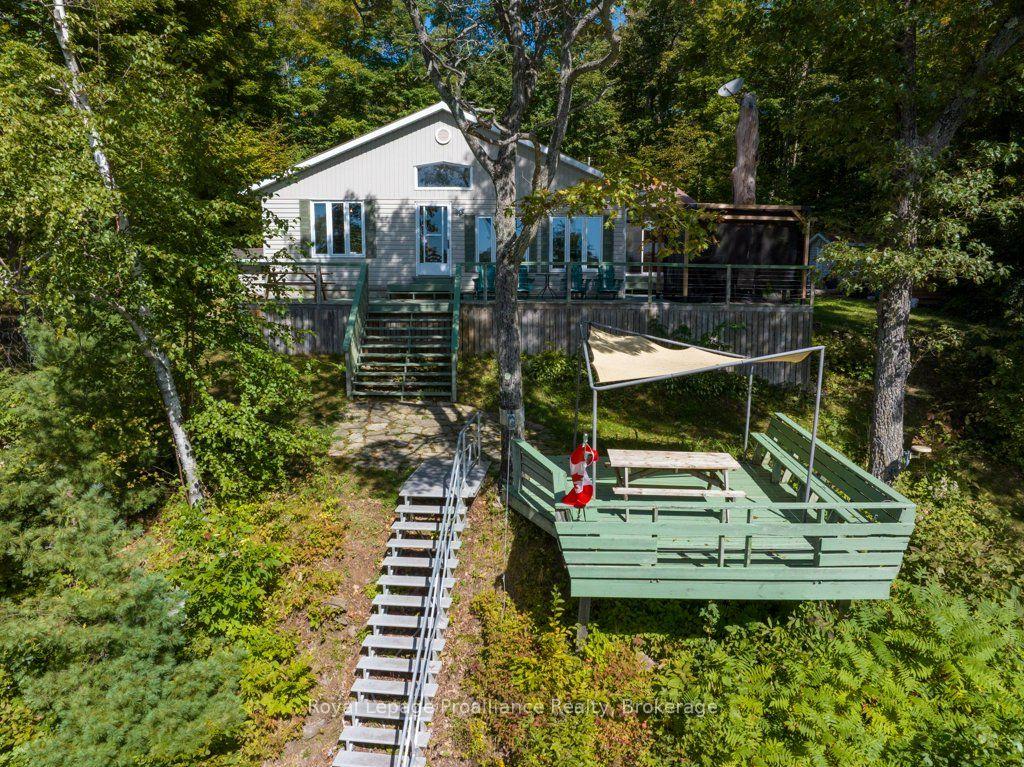 Photo 4 of 1231 Chimney Point Lane, Central Frontenac, Frontenac Centre — HOMEH