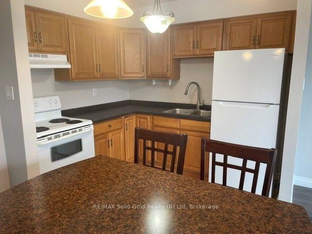 Photo 7 of Unit 104, 24 Midland Drive, Kitchener, Stanley Park — HOMEH
