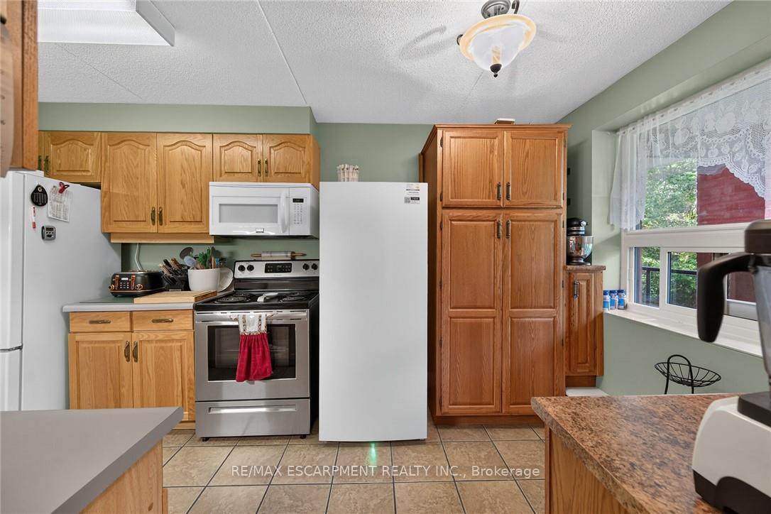 Photo 19 of Unit 202, 5 Mill Pond Court, Norfolk, Simcoe — HOMEH