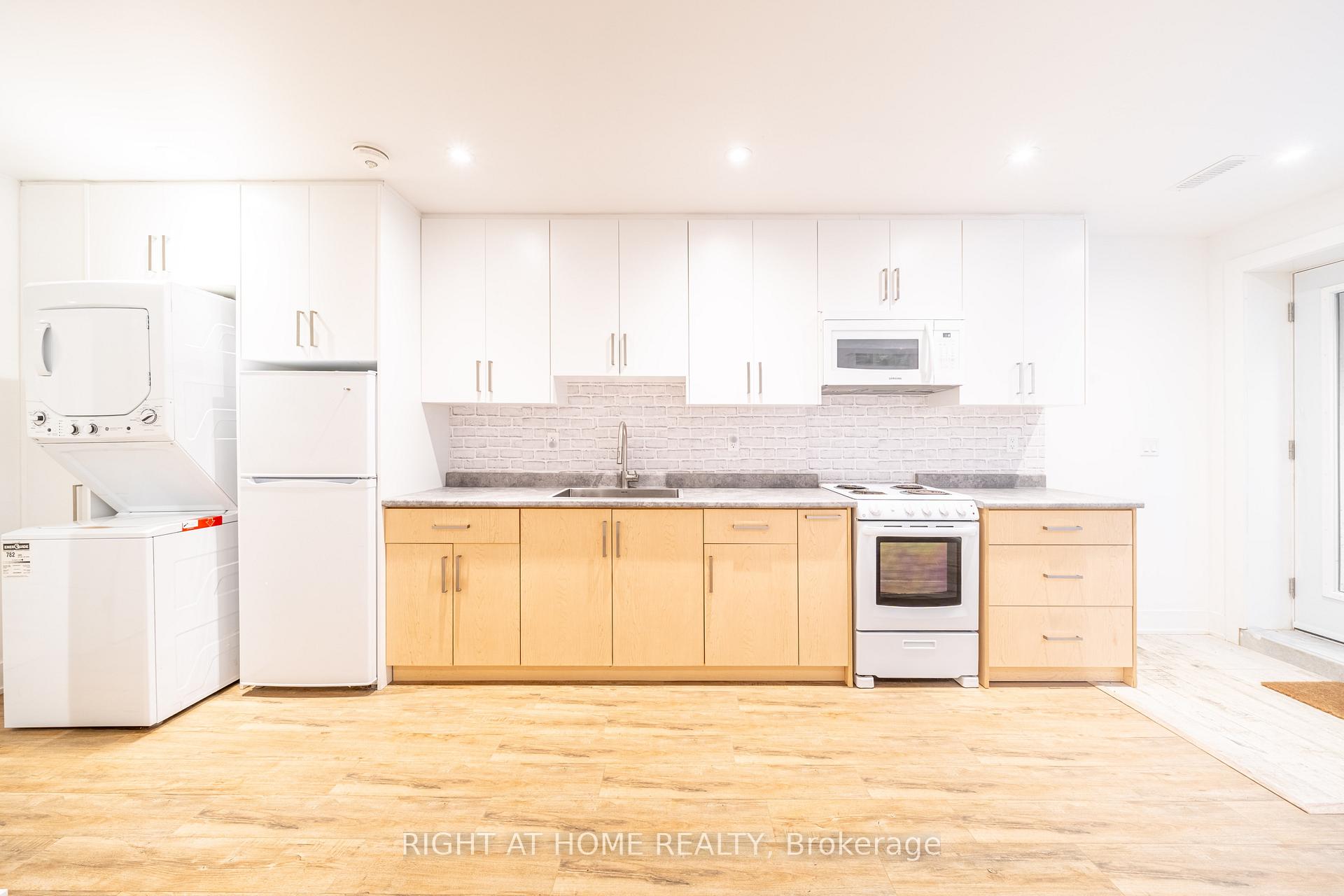 Photo 4 of Unit Lower, 49 B East Drive, Toronto, Rockcliffe-Smythe — HOMEH
