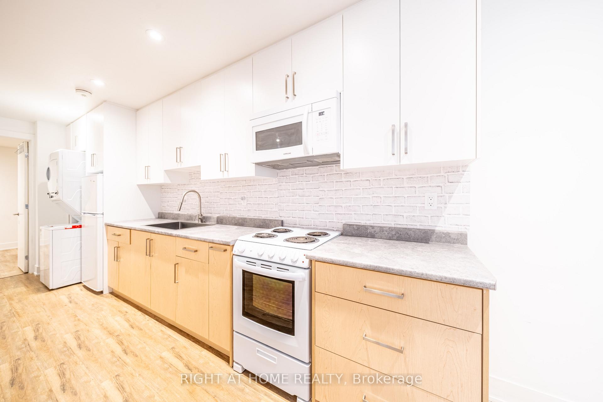 Photo 5 of Unit Lower, 49 B East Drive, Toronto, Rockcliffe-Smythe — HOMEH