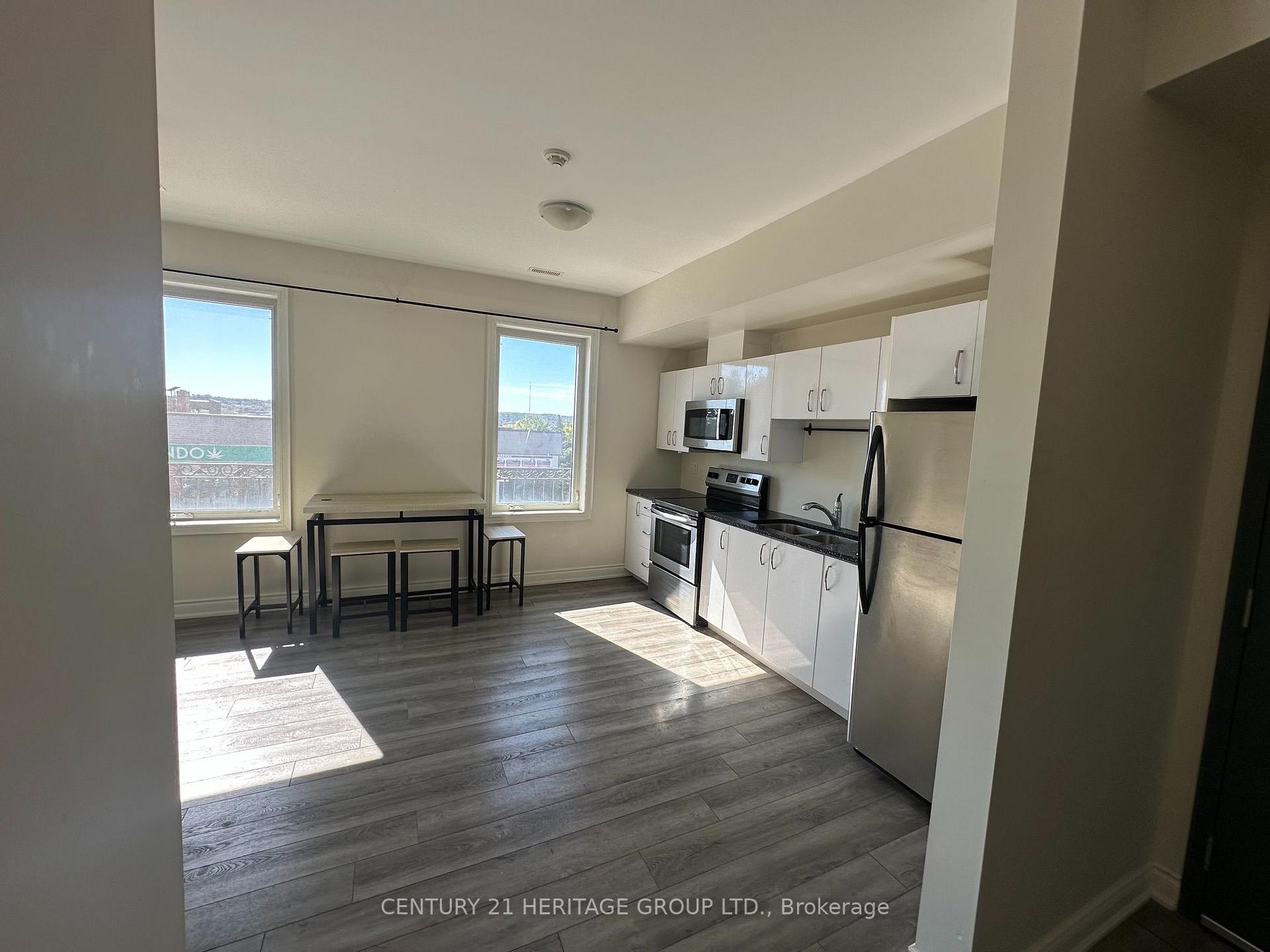Photo 4 of Unit 201, 130 Dunlop Street E, Barrie, City Centre — HOMEH