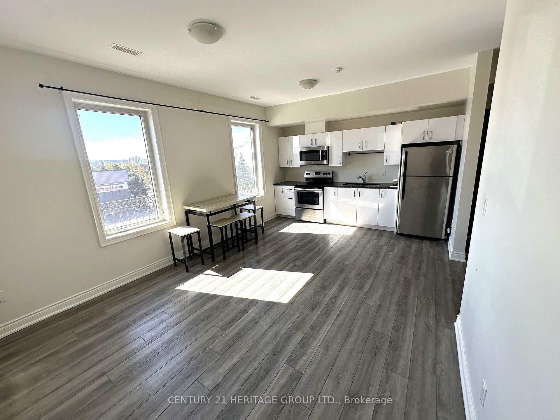 Photo 5 of Unit 201, 130 Dunlop Street E, Barrie, City Centre — HOMEH