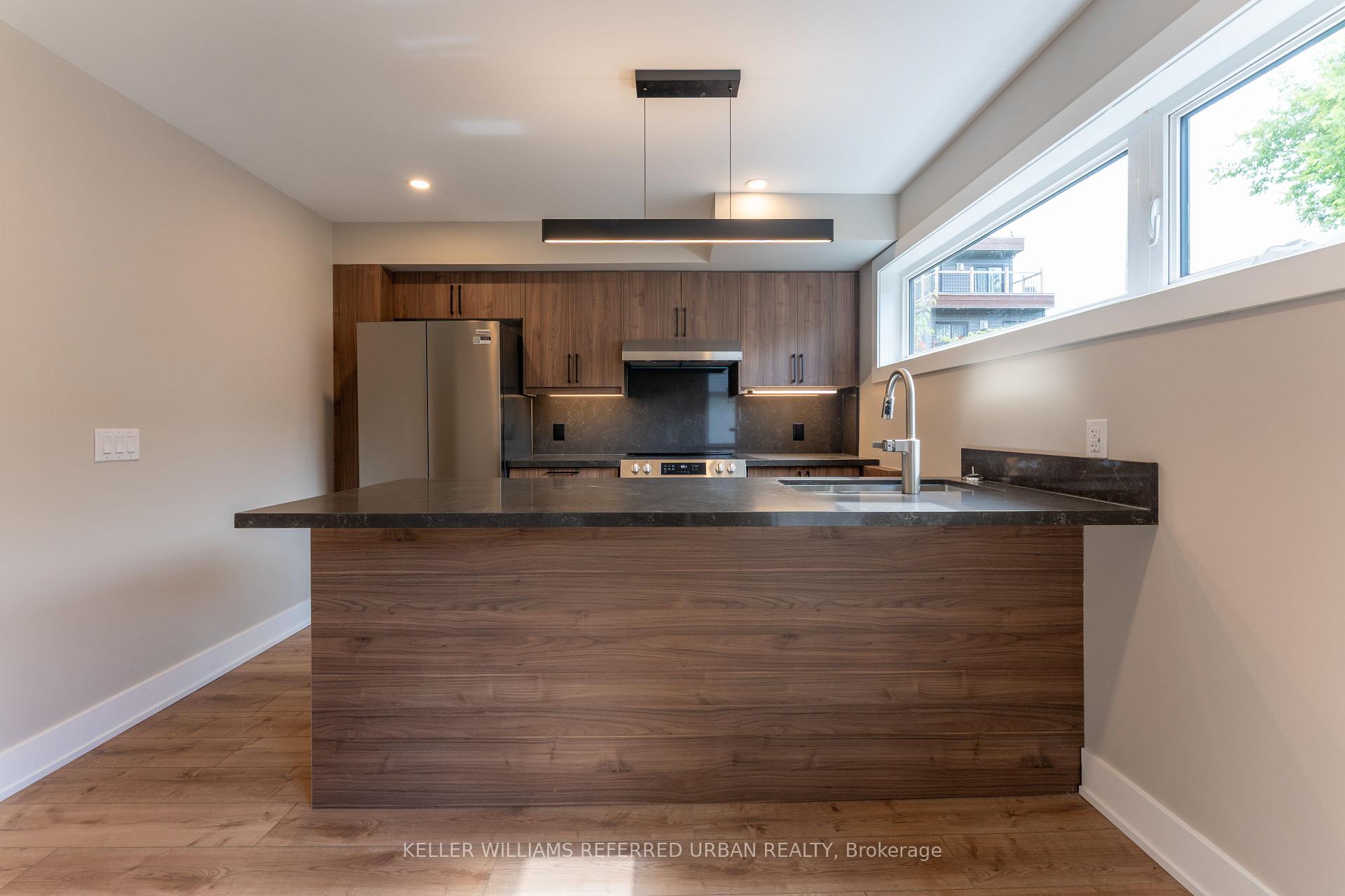 Photo 2 of Unit 5, 352 Jones Avenue, Toronto, Blake-Jones — HOMEH