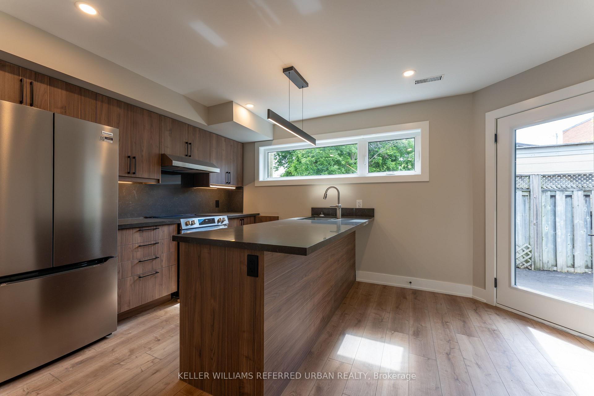 Photo 4 of Unit 5, 352 Jones Avenue, Toronto, Blake-Jones — HOMEH