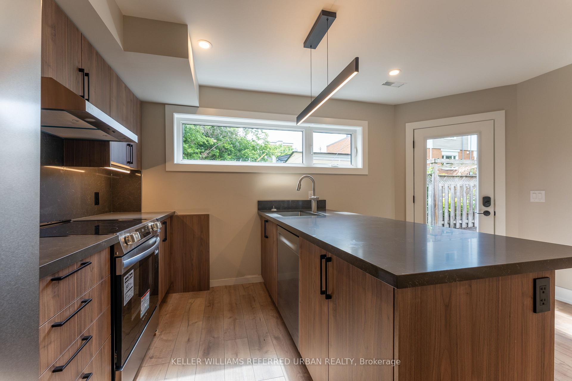 Photo 5 of Unit 5, 352 Jones Avenue, Toronto, Blake-Jones — HOMEH