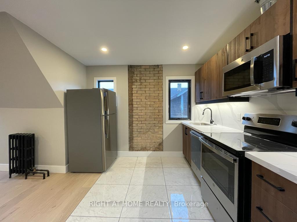 Photo 4 of Unit 3, 363 Parkside Drive, Toronto, High Park-Swansea — HOMEH