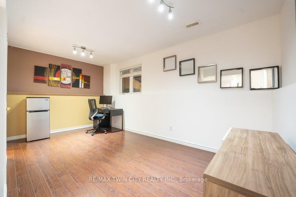 Photo 6 of Unit E33, 110 Activa Avenue, Kitchener, Larentian West — HOMEH