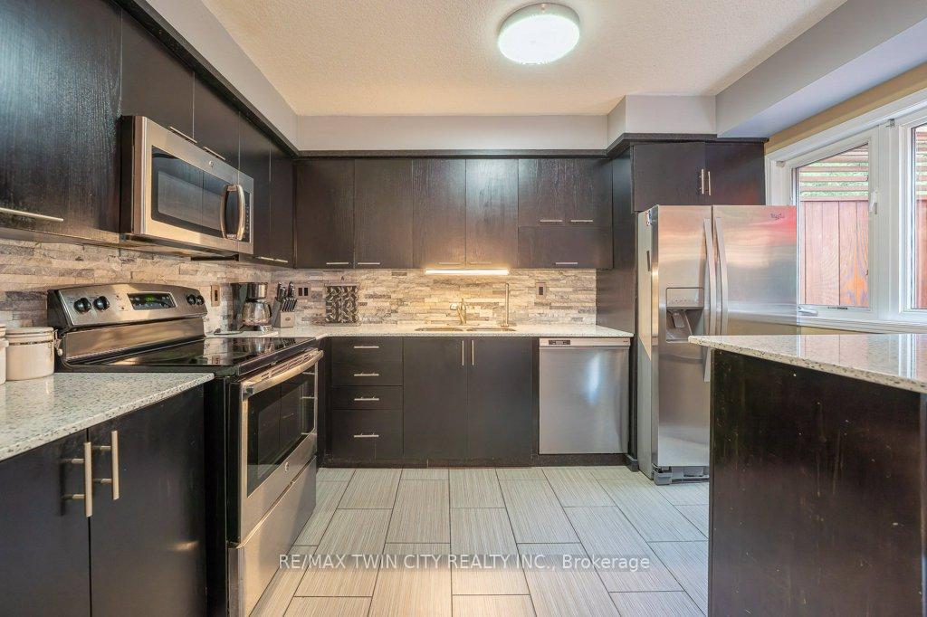 Photo 13 of Unit E33, 110 Activa Avenue, Kitchener, Larentian West — HOMEH