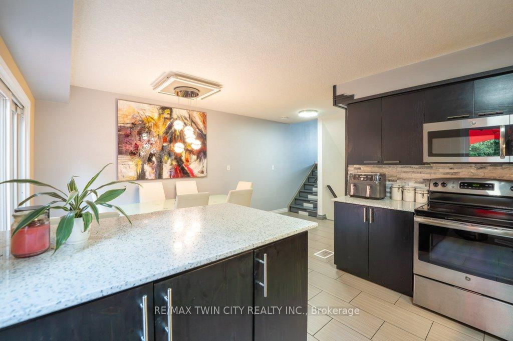 Photo 15 of Unit E33, 110 Activa Avenue, Kitchener, Larentian West — HOMEH