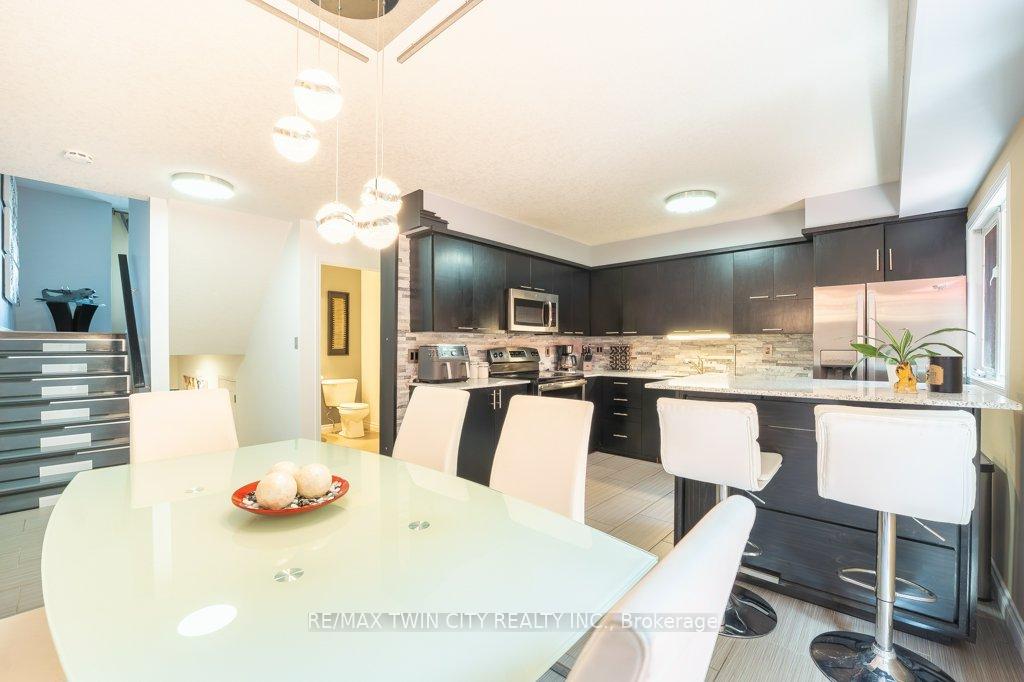 Photo 17 of Unit E33, 110 Activa Avenue, Kitchener, Larentian West — HOMEH