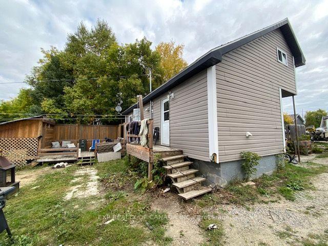 Photo 2 of 167 13th Avenue, Cochrane — HOMEH