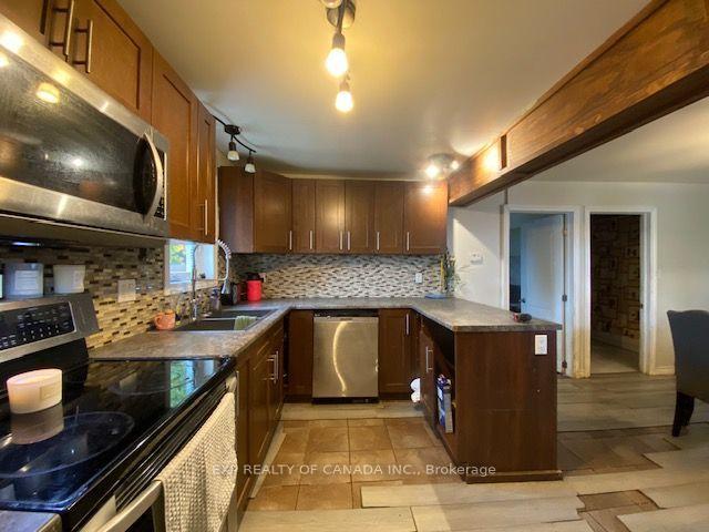 Photo 5 of 167 13th Avenue, Cochrane — HOMEH