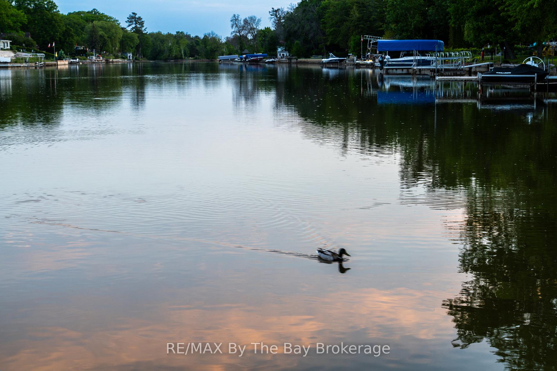 Photo 63 of 83 Old Mosley Street, Wasaga Beach — HOMEH