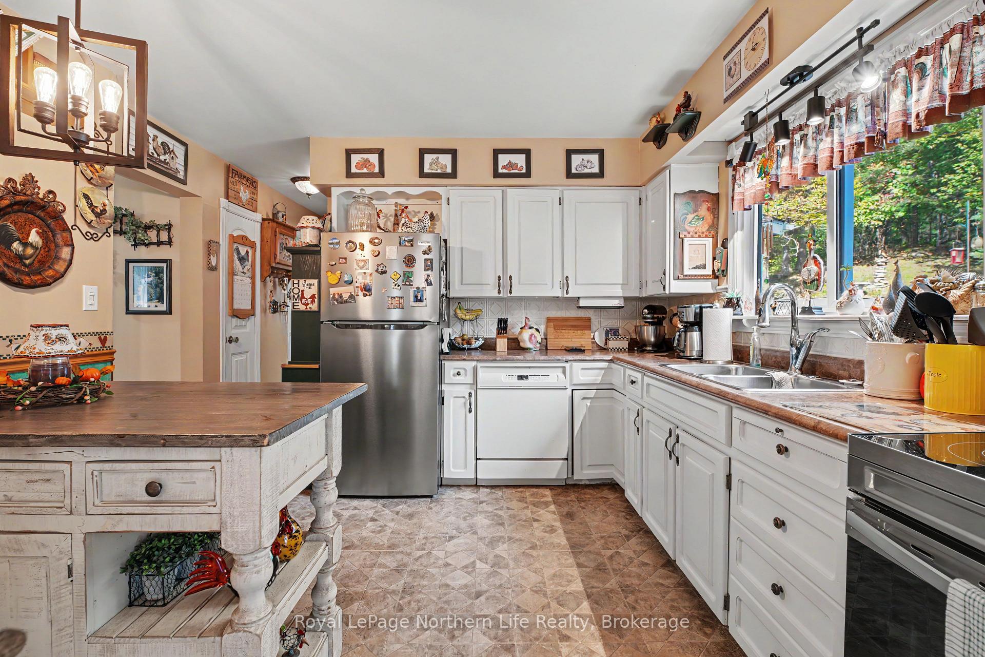 Photo 15 of 534 pinecreek Road S, Callander — HOMEH