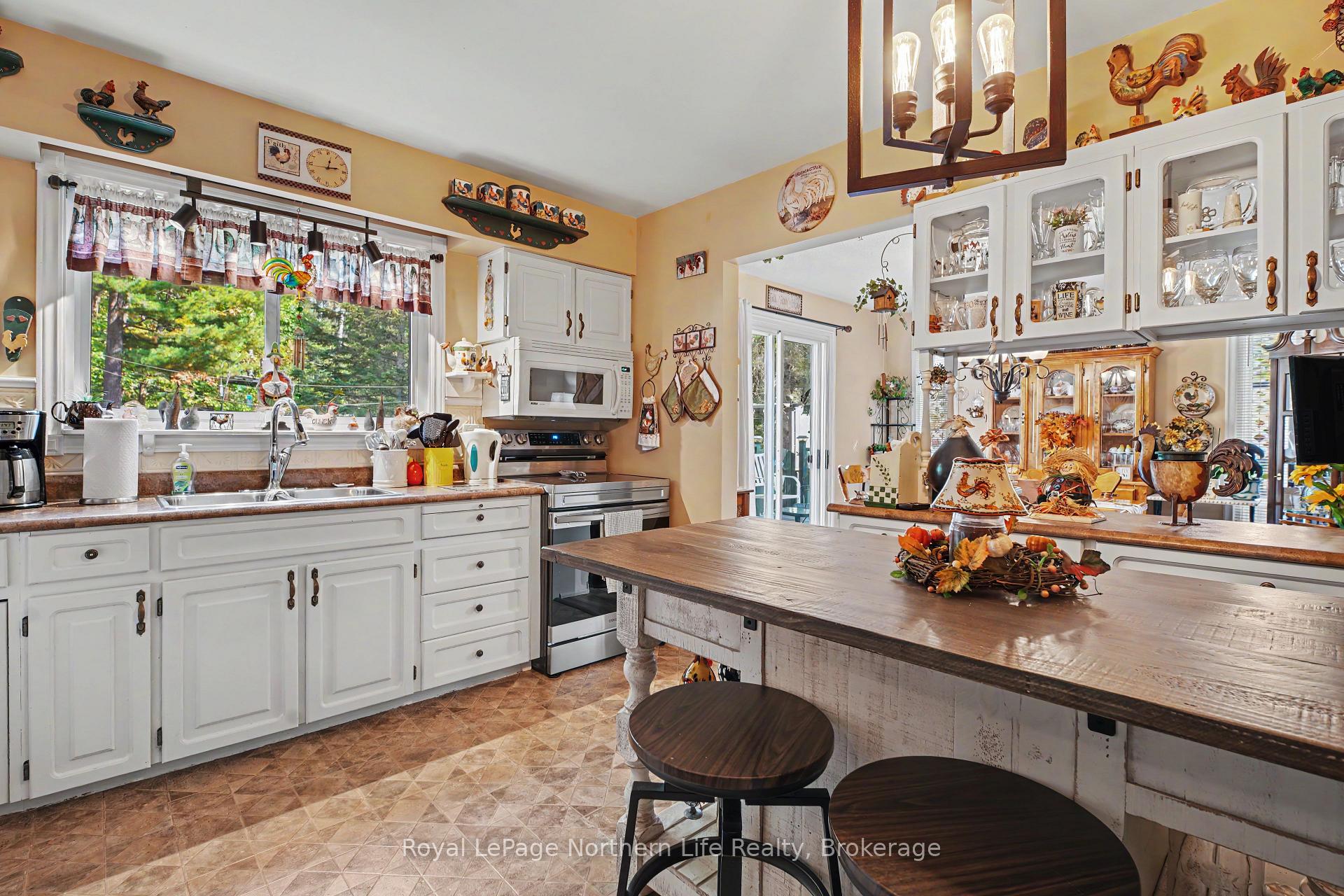 Photo 16 of 534 pinecreek Road S, Callander — HOMEH