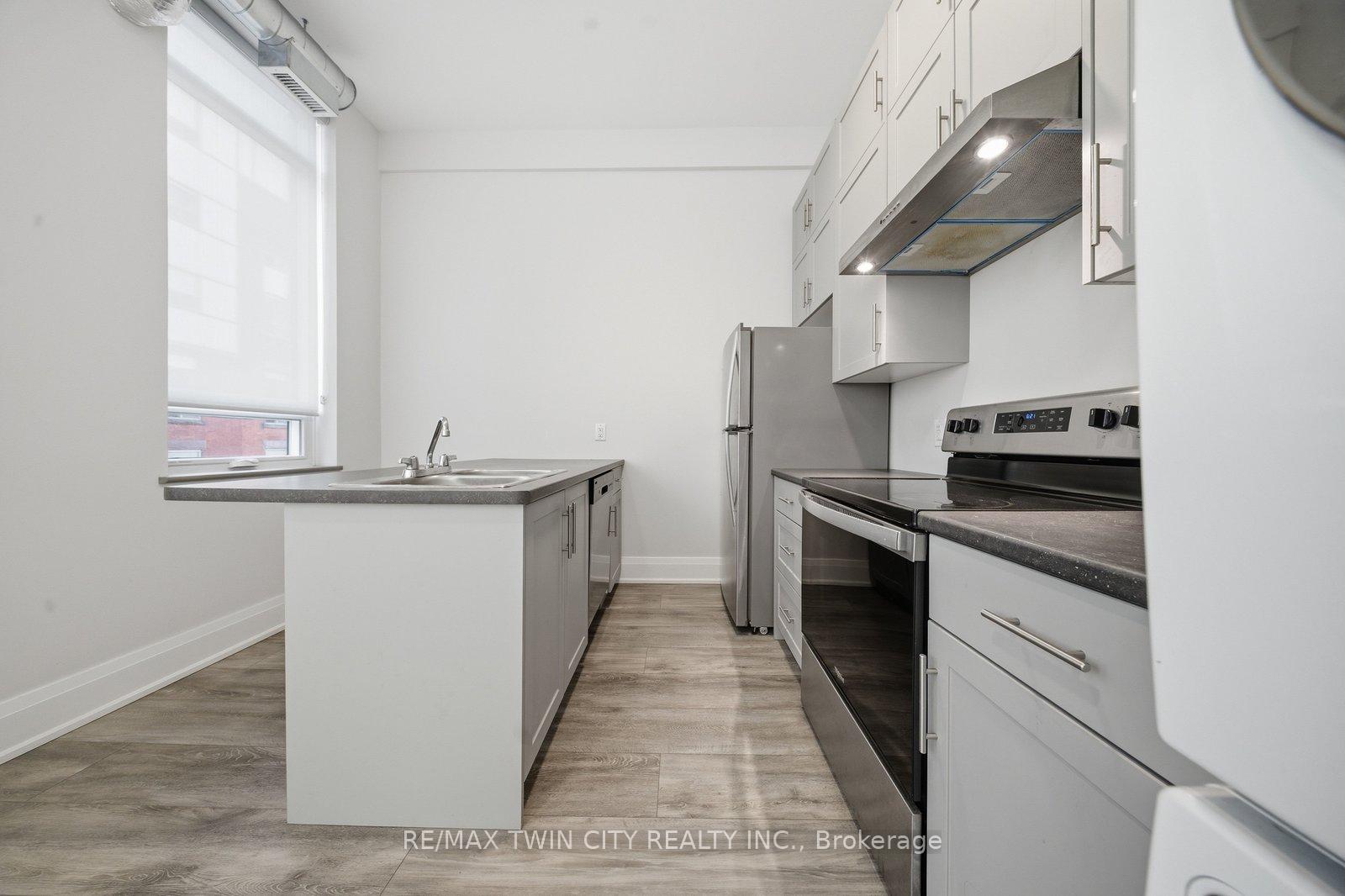 Photo 5 of Unit 201, 11 Queen Street, Brantford, Downtown Core — HOMEH