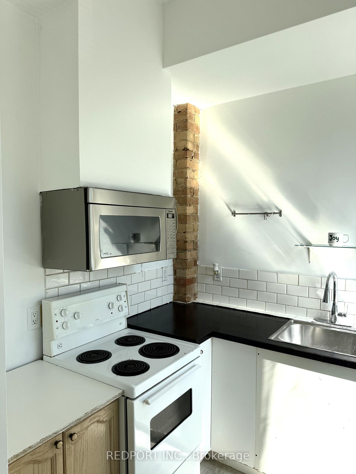 Photo 2 of Unit 1, 406 Dundas Street E, Toronto, Moss Park — HOMEH