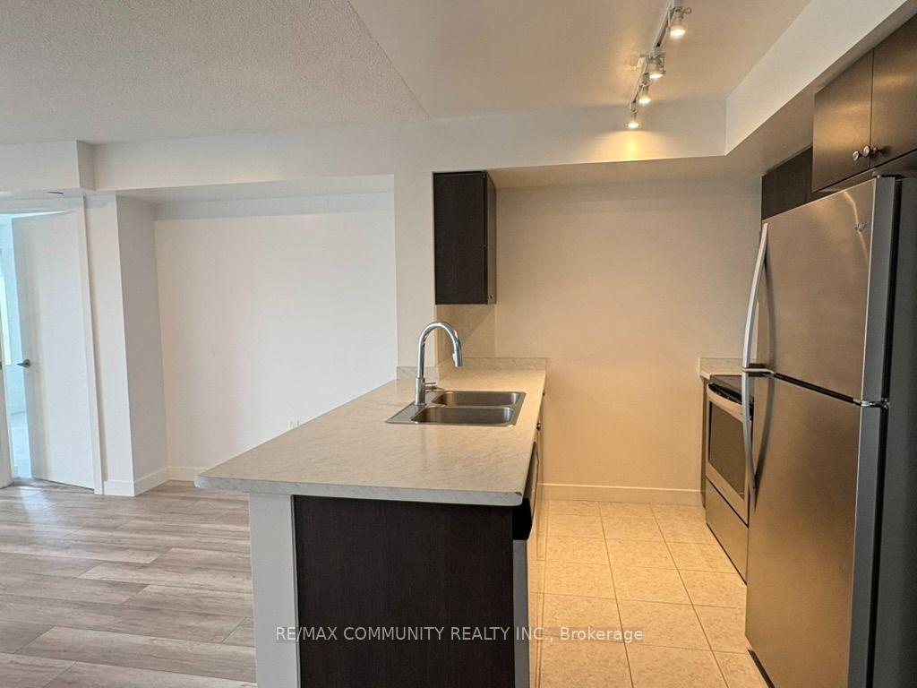 Photo 3 of Unit 811, 1346 Danforth Road, Scarborough, Eglinton East — HOMEH