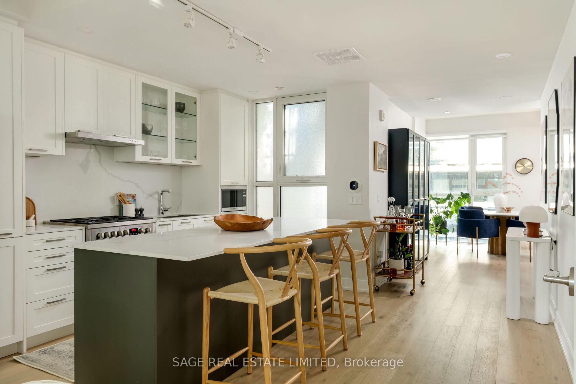 Photo 1 of Unit Th01, 1331 Queen Street E, Toronto, South Riverdale — HOMEH