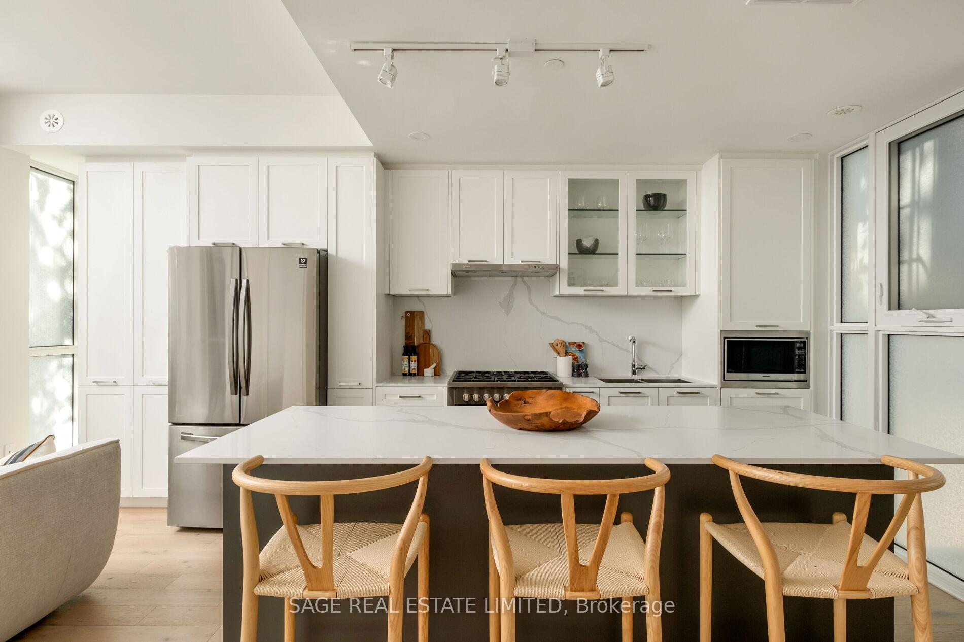 Photo 6 of Unit Th01, 1331 Queen Street E, Toronto, South Riverdale — HOMEH