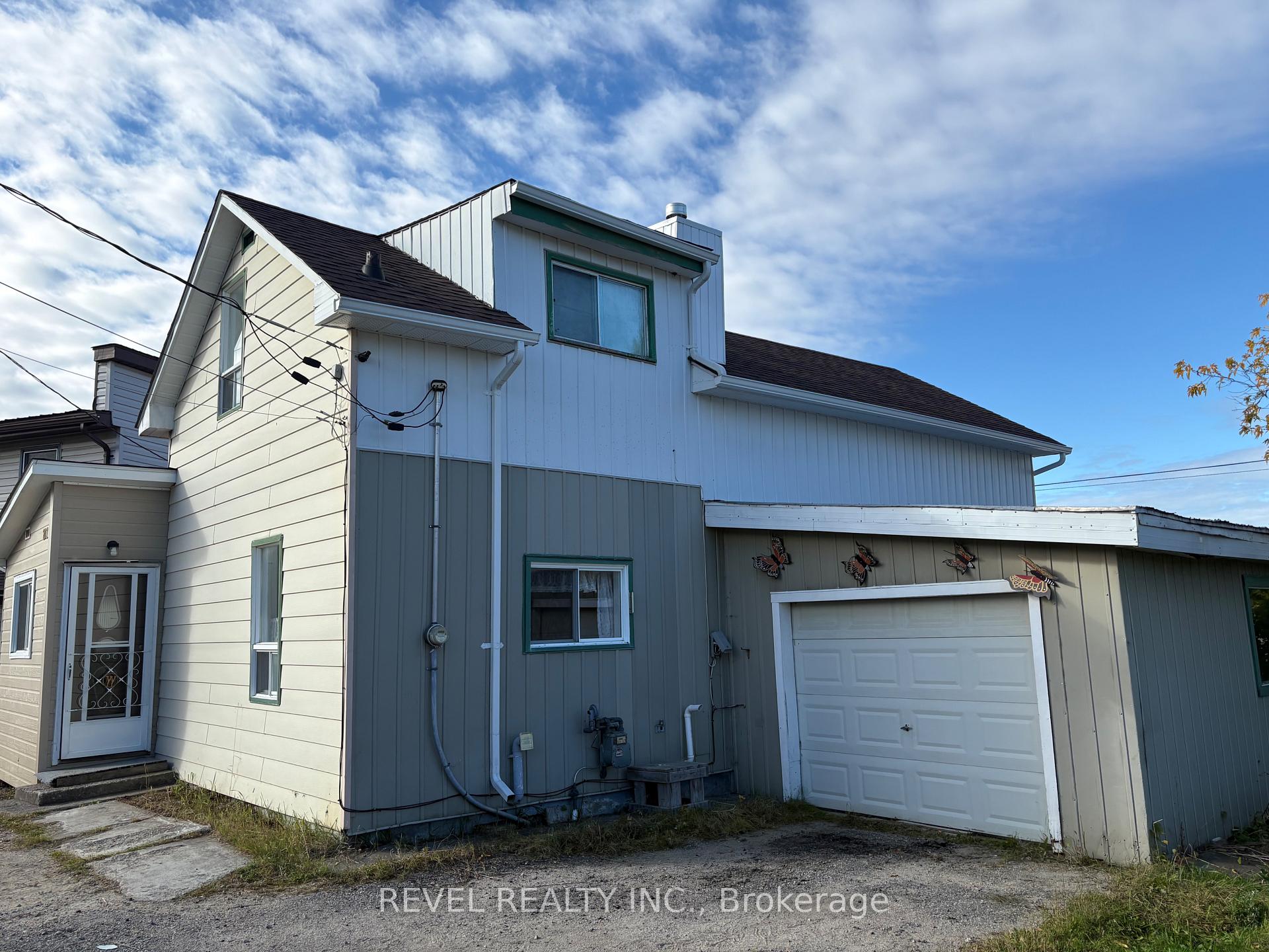 Photo 1 of 207 Co-op Lane, Cochrane — HOMEH