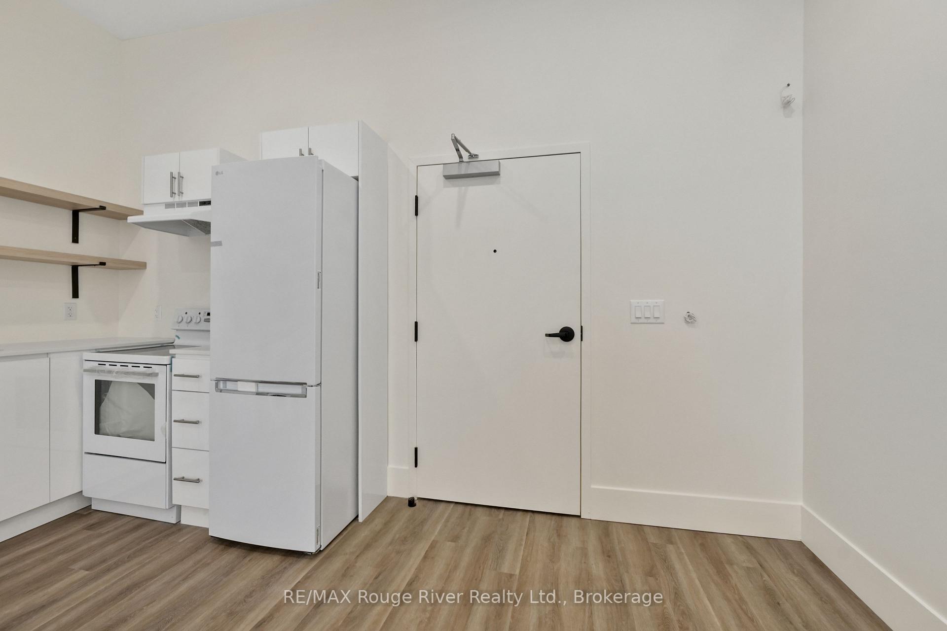 Photo 3 of Unit 203, 29a King Street W, Cobourg — HOMEH