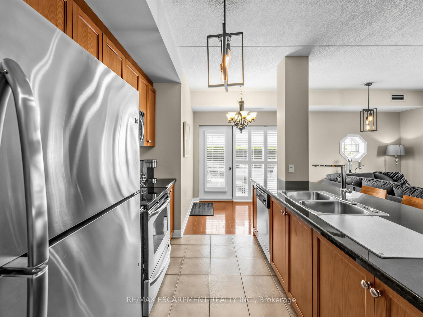 Photo 3 of Unit 103, 1379 Costigan Road, Milton, Clarke — HOMEH