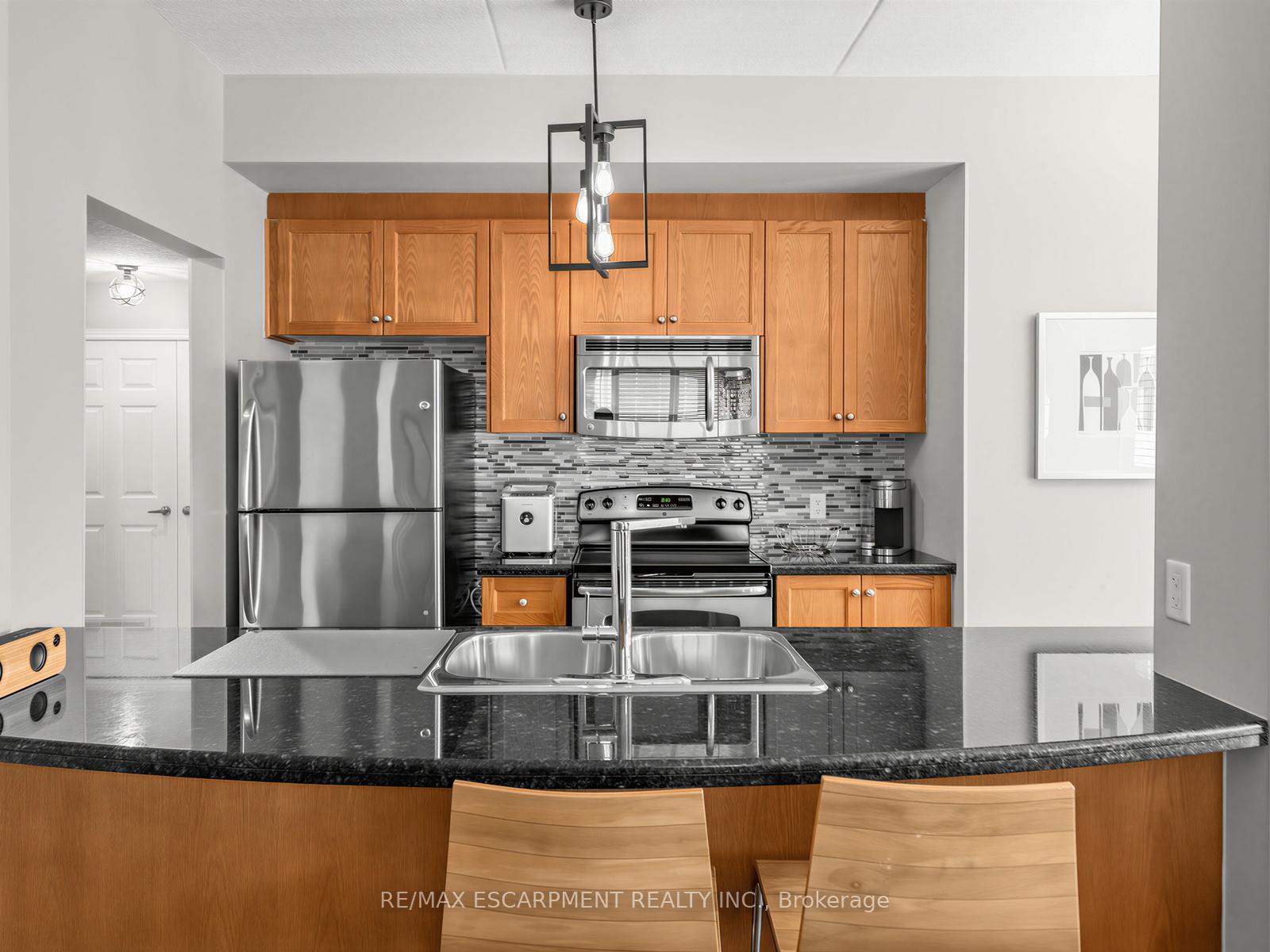 Photo 4 of Unit 103, 1379 Costigan Road, Milton, Clarke — HOMEH