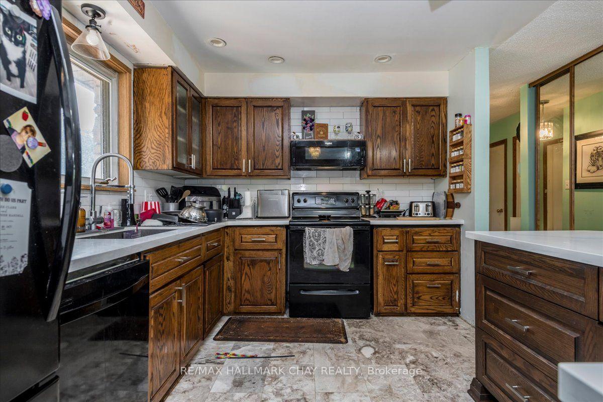 Photo 5 of 611 Big Bay Point Rd, Barrie, Bayshore — HOMEH