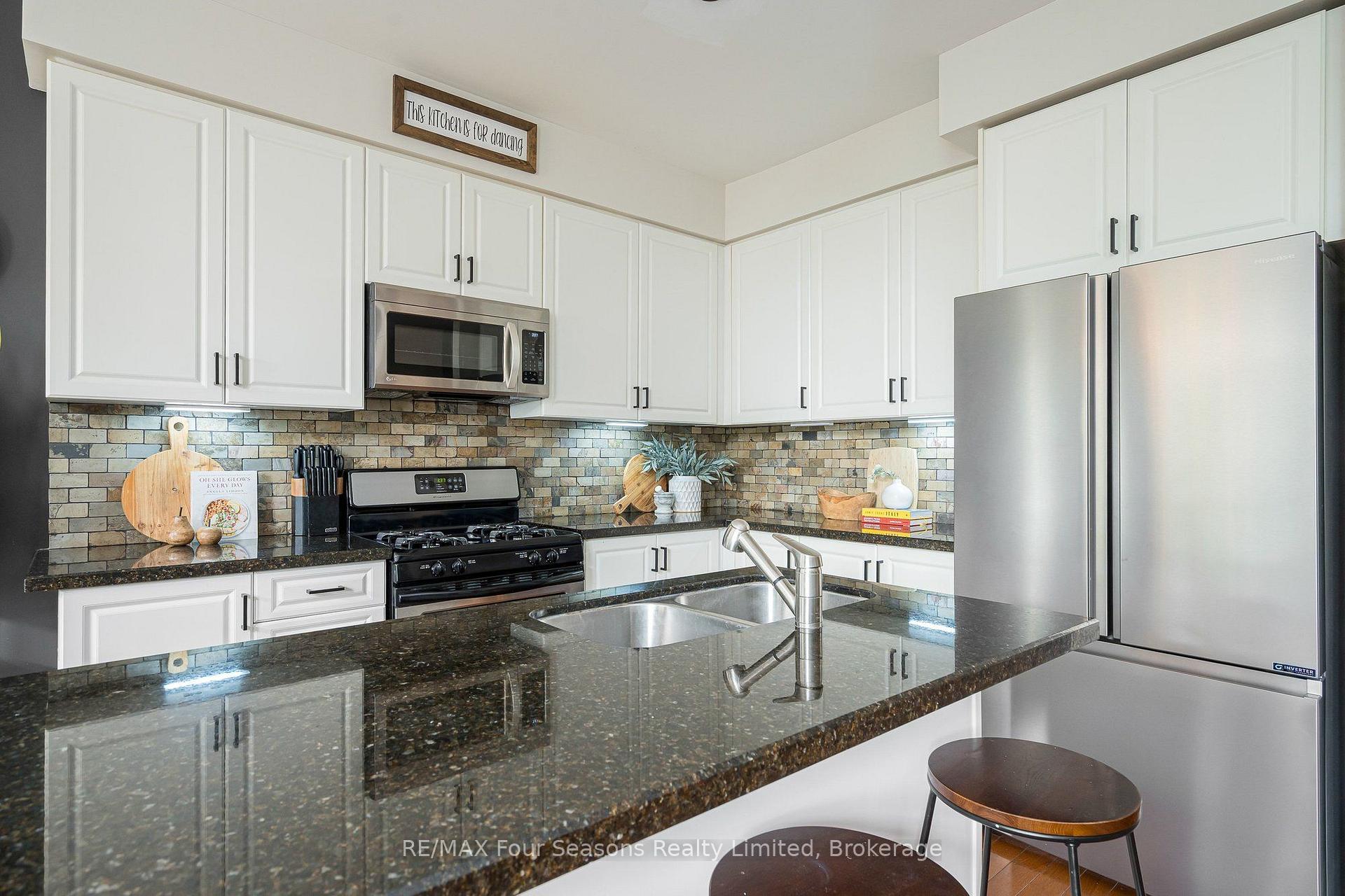 Photo 12 of 32 Christy Drive, Wasaga Beach — HOMEH