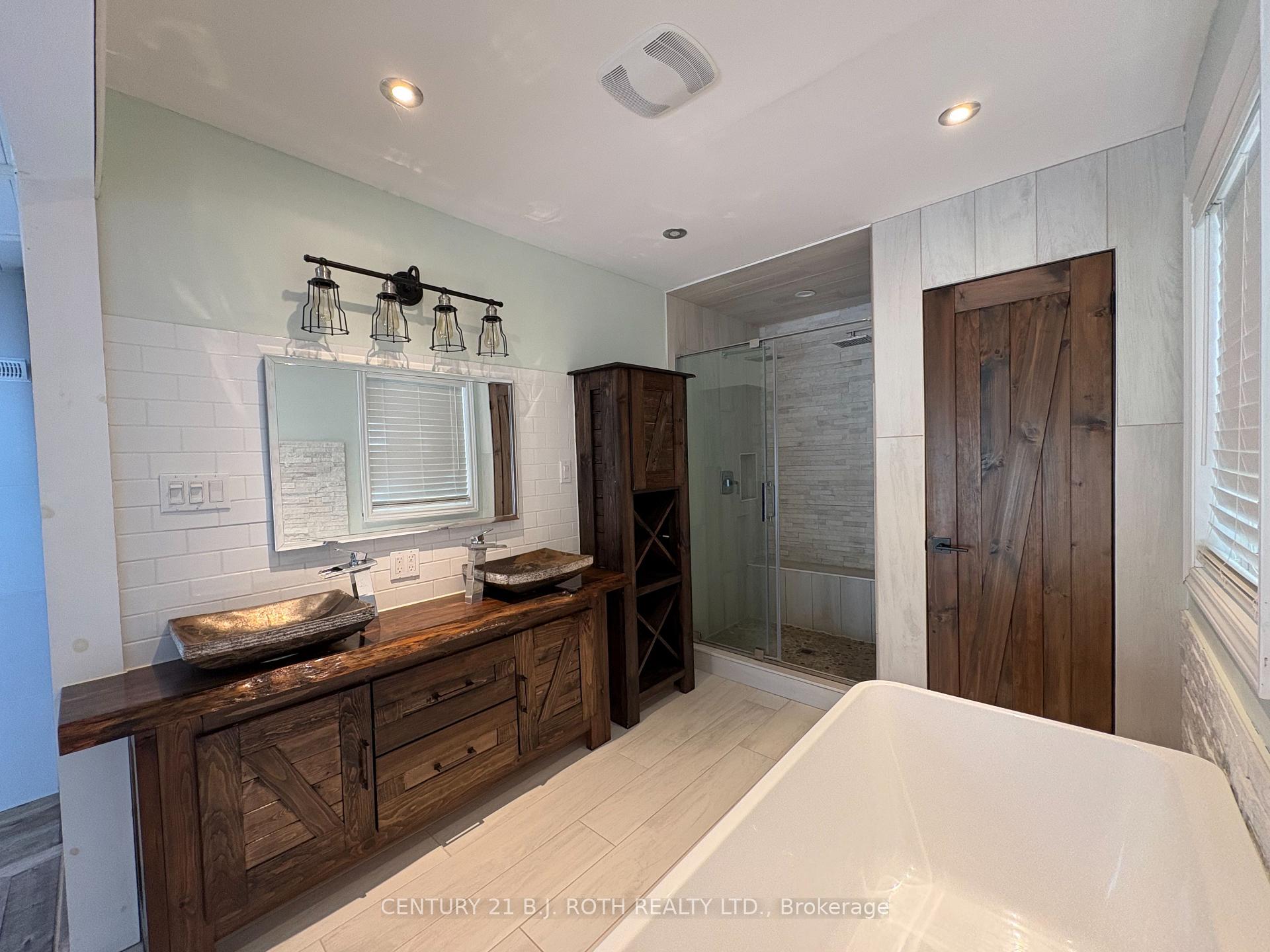 Photo 17 of 288 River Road E, Wasaga Beach — HOMEH