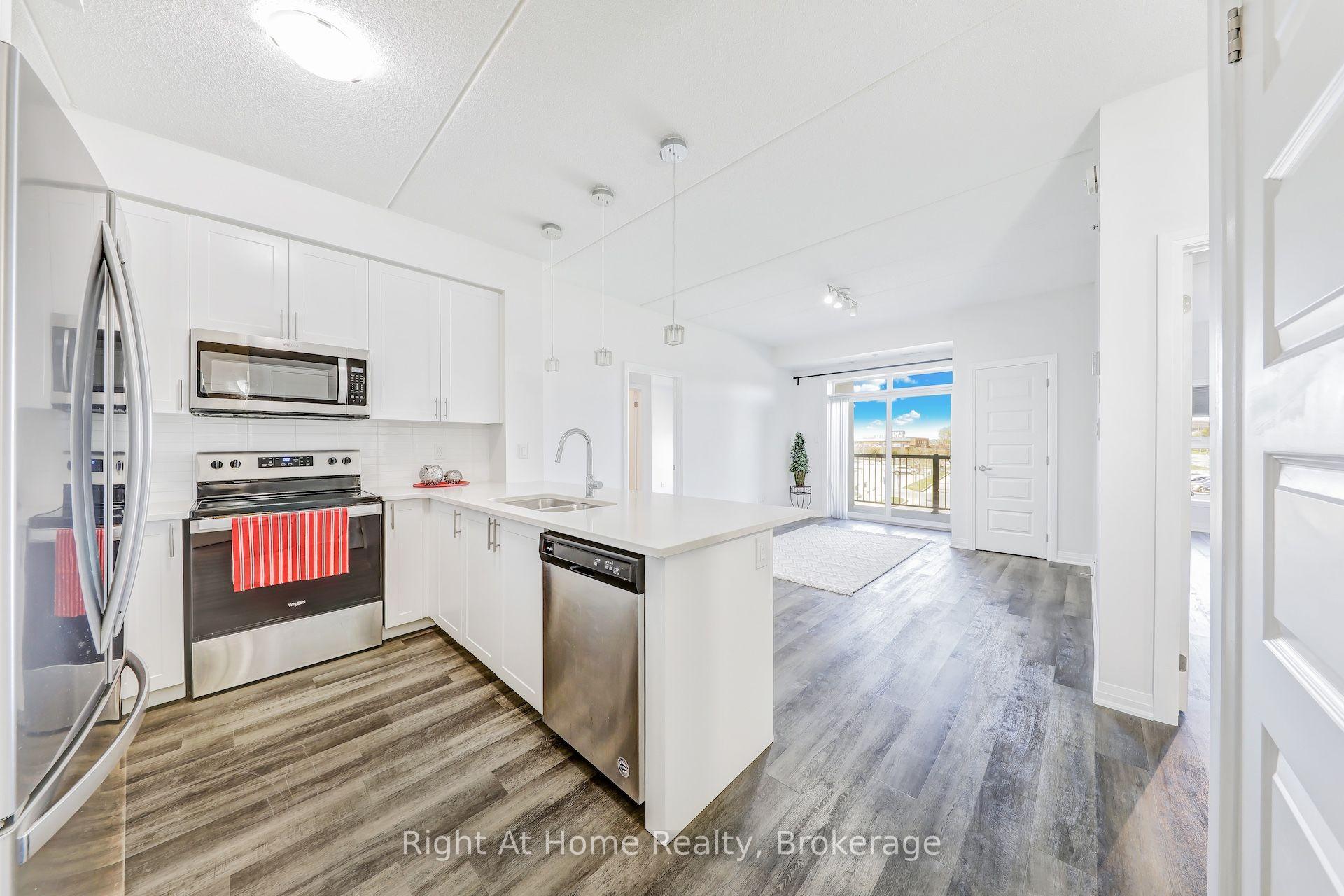 Photo 5 of Unit 307, 610 Farmstead Drive, Milton, Willmott — HOMEH