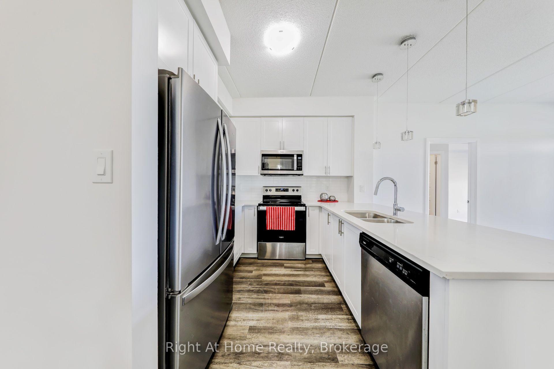 Photo 6 of Unit 307, 610 Farmstead Drive, Milton, Willmott — HOMEH