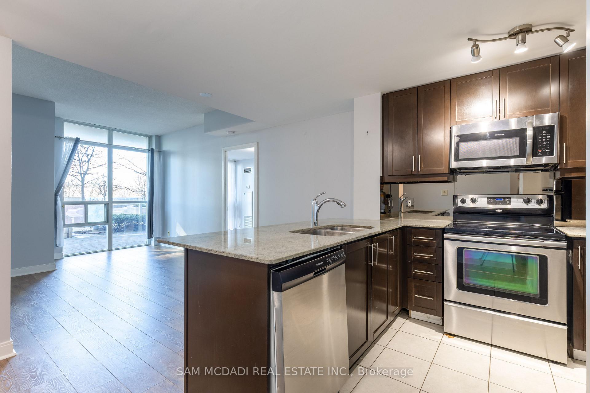 Photo 3 of Unit 310, 70 Absolute Avenue, Mississauga, City Centre — HOMEH