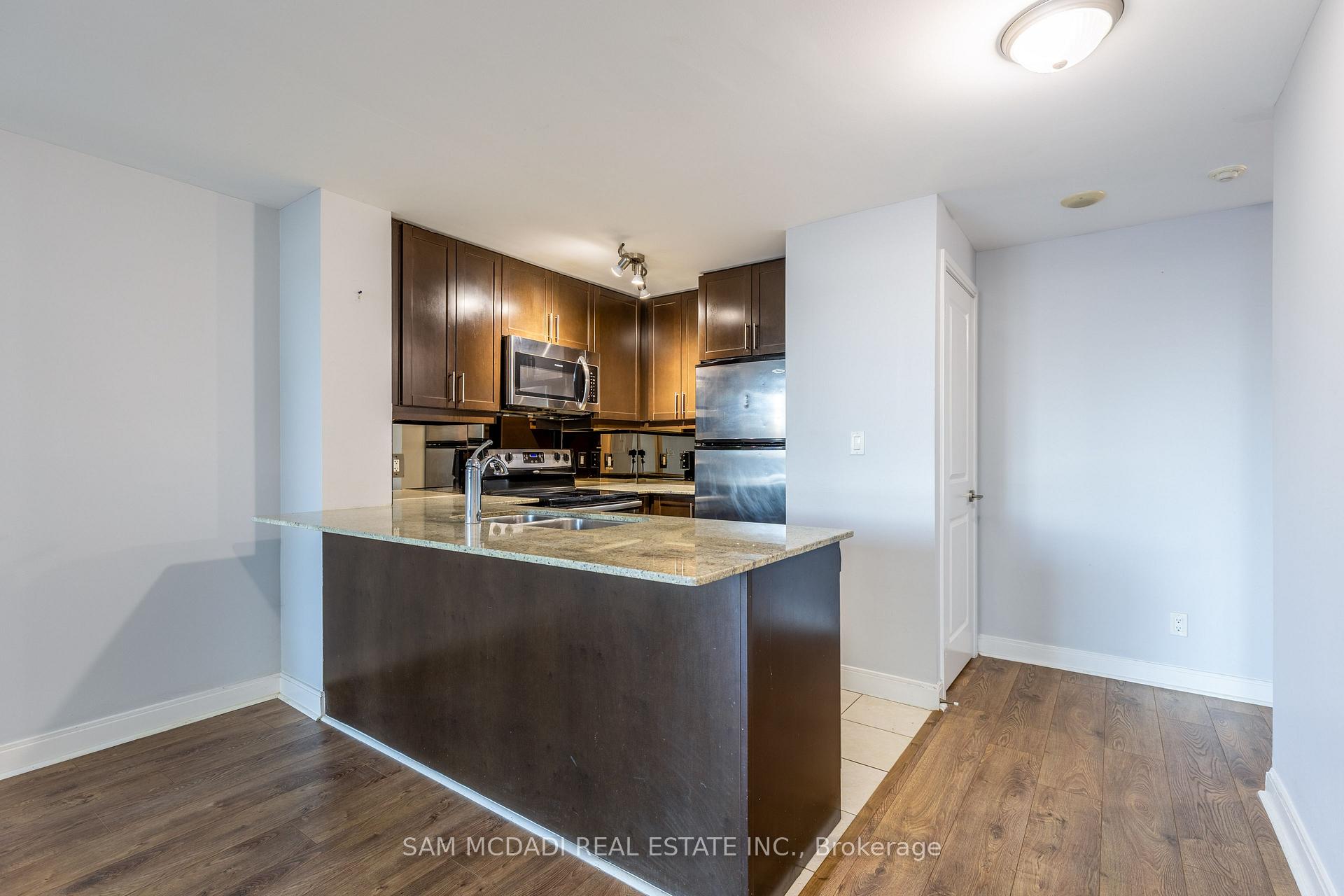 Photo 4 of Unit 310, 70 Absolute Avenue, Mississauga, City Centre — HOMEH